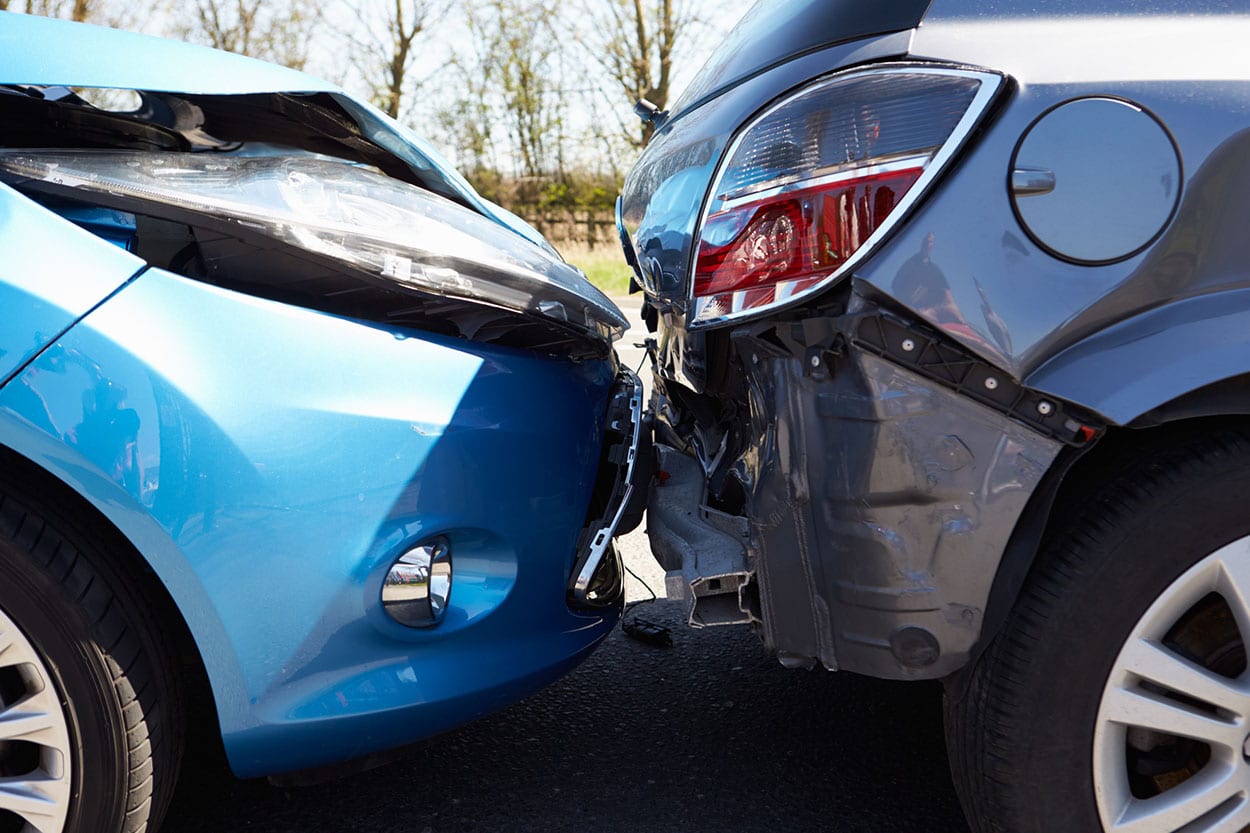 photo of two vehicles in a car accident, the at-fault driver does not have insurance
