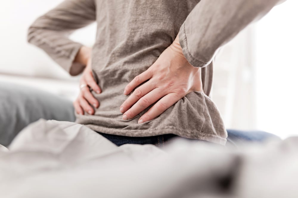 photo of an injured victim of a car accident, dealing with chronic pain due to the negligence of someone else